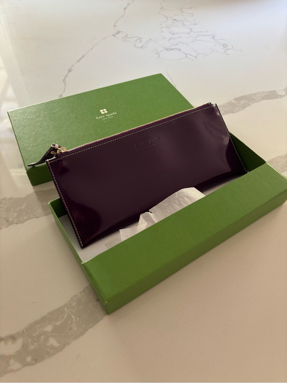 NWT Kate Spade patent plum zip pouch with gold hardware